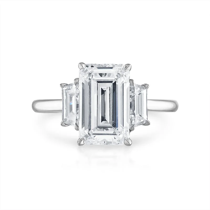 Emerald Cut Three-Stone with Trapezoid Side Stones Engagement Ring