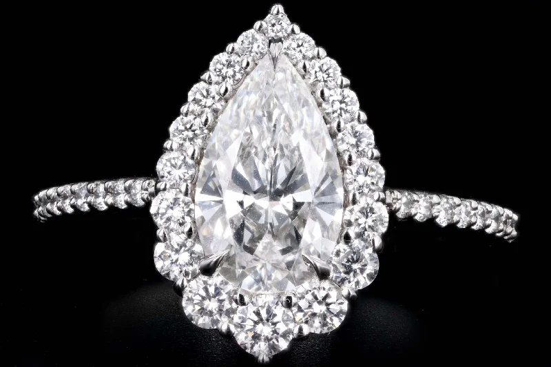 Platinum 1.63 Carat Pear Cut Diamond Graduated Halo Engagement Ring GIA Certified